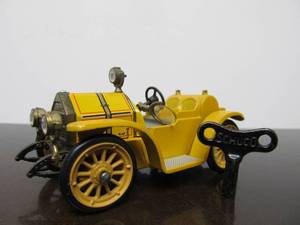 lot 94 image: Vintage SCHUCO Micro-Racer Car wKey - Yellow Old Timer Mercer 35J