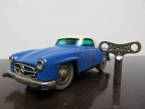 lot 98 image: Vintage SCHUCO Micro-Racer Car wKey - Blue & White Mercedes 190SL - BlueGreen Windows