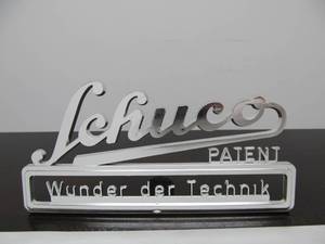 lot 105 image: Vintage ChromeHard Plastic SCHUCO Advertising Display