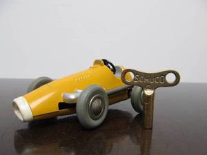 lot 110 image: Vintage SCHUCO Micro-Racer Race Car wKey - Yellow 1040