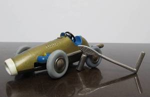lot 121 image: Vintage SCHUCO Micro-Racer Race Car wKey - Gold wBlue 1040