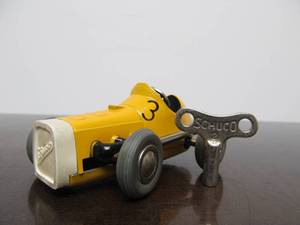 lot 123 image: Vintage SCHUCO Micro-Racer Race Car wKey - Yellow 1041