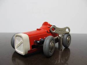 lot 124 image: Vintage SCHUCO Micro-Racer Race Car wKey - Red 1041