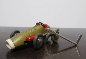 lot 125 image: Vintage SCHUCO Micro-Racer Race Car wKey - Gold wRed 1040