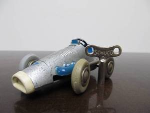 lot 126 image: Vintage SCHUCO Micro-Racer Race Car wKey - Silver wBlue 1041