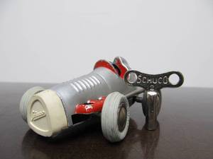lot 131 image: Vintage SCHUCO Micro-Racer Race Car wKey - Silver w Red