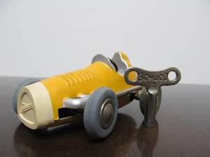 lot 135 image: Vintage SCHUCO Micro-Racer Race Car wKey - Yellow 1042