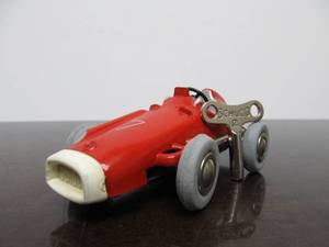 lot 142 image: Vintage SCHUCO Micro-Racer Race Car wKey - Red 1043