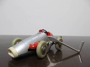 lot 145 image: Vintage SCHUCO Micro-Racer Race Car wKey - Silver 1040 wRed
