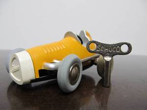 lot 147 image: Vintage SCHUCO Micro-Racer Race Car wKey - Yellow 1042
