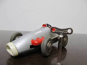 lot 148 image: Vintage SCHUCO Micro-Racer Race Car wKey - Silver 1040 wRed