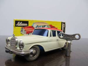 lot 159 image: Vintage SCHUCO Micro-Racer Car wKey - White & Red Mercedes 220S wOriginal Box