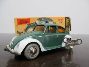 lot 163 image: Vintage SCHUCO Micro-Racer Race Car wKey - Green & White Volkswagen wSiren wOriginal Box