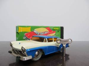 lot 169 image: Vintage SCHUCO Micro-Racer Car wKey - Blue & White FORD Yellow Windows wOriginal Box