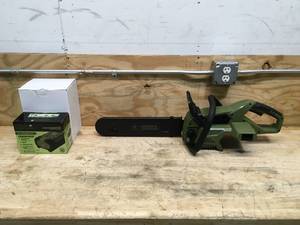 lot 9 image: Green Machine Cordless Chainsaw With 2.5AH Battery And Charger Model # GMCS6200