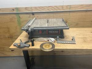 lot 199 image: RIDGID 6.5-Amp 7 in. Blade Corded Table Top Wet Tile Saw