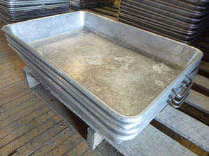 lot 32 image: 4 Baking Pans with Handles
