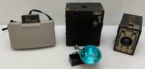lot 50 image: Vintage Polaroid 104 Camera & More