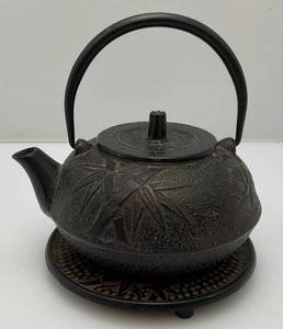 lot 138 image: Decorative Cast Iron Teapot With Bamboo Design & Cast Iron Stand