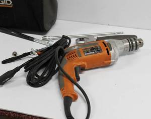 lot 49 image: RIDGID Heavy Duty Drill 120 Volts Comes In Original Case