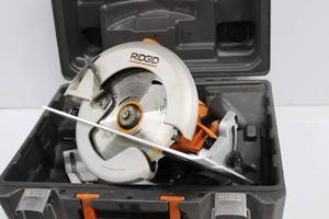 lot 52 image: RIDGID 3200 7 14 Circular Saw 120 Volts In Original Case
