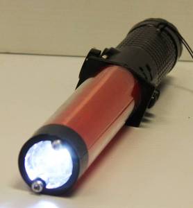 lot 86 image: Bright Safety LED Traffic Baton Flashlight Stick With Self - Whistle, Front Light & Magnetic Base New In Box