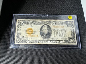 lot 77 image: 1928 G $20 Gold Certificate Currency in Fine Condition. Very Attractive Note -Gold Lettering. Compare on Ebay at $195.00