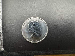 lot 83 image: 2011 BU One Ounce Silver Canadian Maple Leaf $5.00 Coin