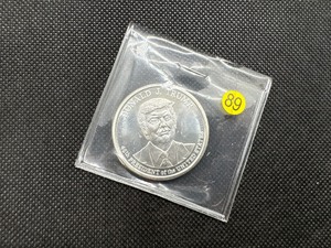 lot 89 image: BU One Ounce .999 Silver Donald J. Trump Round