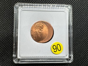 lot 90 image: 1999 Bright Red Mint Error Cent