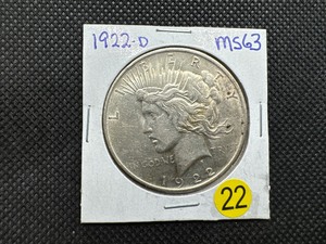 lot 22 image: 1922-D Peace Silver Dollar Marked MS63 When Purchased