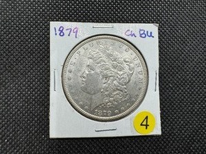lot 4 image: 1879 Morgan Silver Dollar Marked Choice BU When Purchased