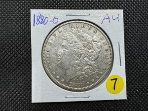 lot 7 image: 1880-O Morgan Silver Dollar  Marked AU When Purchased