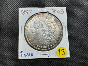 lot 13 image: 1887 Nicely Toned Morgan Silver Dollar Marked MS63 When Purchased