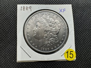 lot 15 image: 1889 Morgan Silver Dollar Marked XF When Purchased