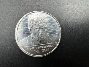 lot 66 image: BU One Ounce .999 Silver Donald J. Trump Never Surrender Round