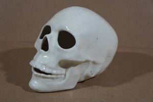lot 7 image: Large Skull Candle Holder