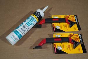 lot 86 image: 2  Caulk Tools with Dap All Purpose Silicone