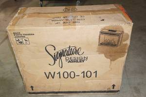 lot 198 image: Signature by Ashley Fireplace Insert W100-101
