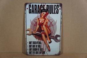 lot 214 image: Metal Garage Rules Sign