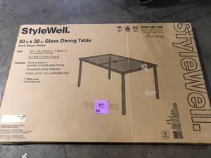 lot 7 image: Stylewell 60 in. X 38 in. Glass Dining Table  Customer Returns See Pictures