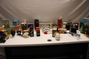 lot 901 image: Assorted Collectible Avon Bottles