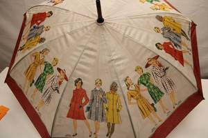 lot 33 image: Simplicity Vintage Umbrella with Fashion Illustrations