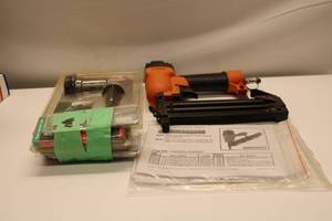 lot 44 image: Bostitch Nail Gun with Accessories and Lighting Kit