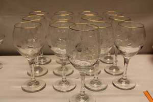lot 57 image: Set of 14 Etched Wine Glasses with Gold Rim