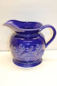 lot 77 image: Vintage Blue Ceramic Pitcher with Bird Design