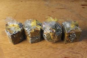 lot 138 image: Animal Print Decorative Candle Set