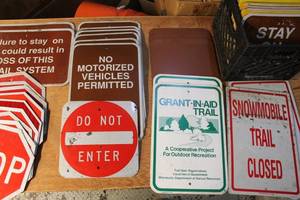 lot 157 image: Assorted Trail and Road Signage Lot