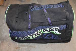 lot 183 image: Arctic Cat Accessories Lot with Gloves, Duffel Bag, and Cleaner