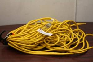 lot 229 image: Heavy-Duty Yellow Electrical Extension Cord - 100 Feet